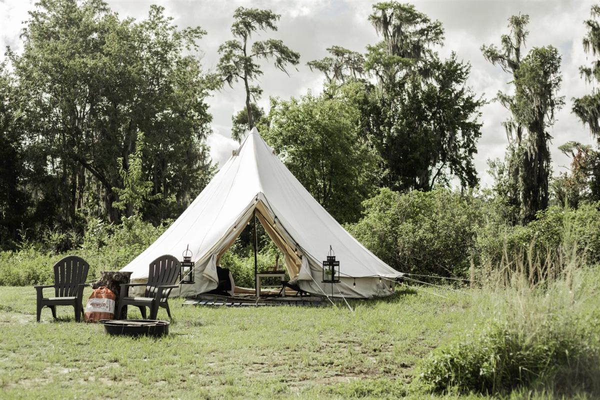 A glamping bell tent set up at Lake Louisa